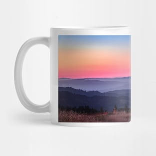 Sunset over blue mountains Mug